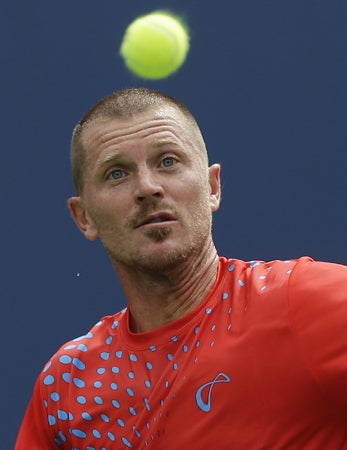 Alex Bogomolov Jr. watches a ball hit 