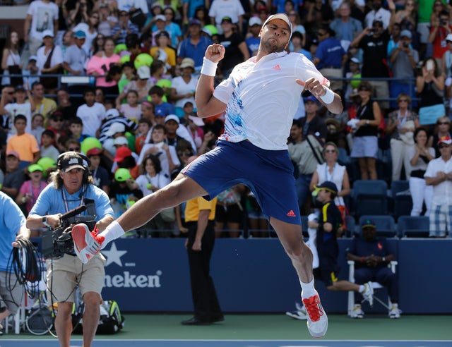 France's Jo-Wilfried Tsonga celebrates after winning his match 