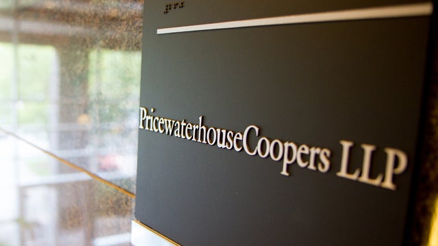 Sign outside PricewaterhouseCoopers office in Franklin, Tenn. 
