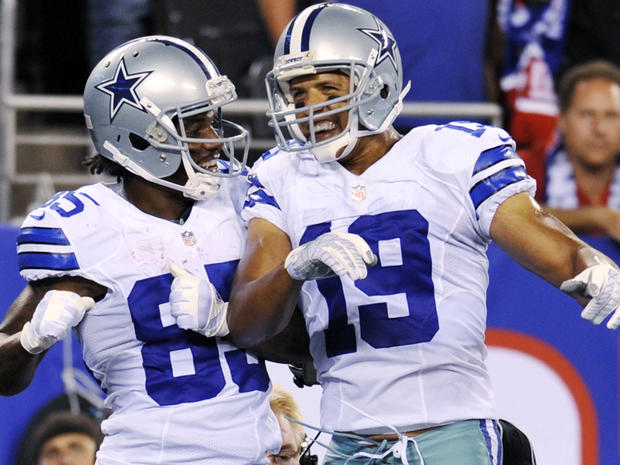 Cowboys wide receivers Miles Austin (19) and Kevin Ogletree (85) celebrate Ogletree's touchdown 