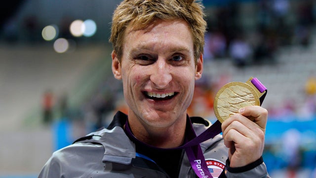 Gold medalist Bradley Snyder of the United States poses following the medal ceremony for the men's 100m Freestyle. 