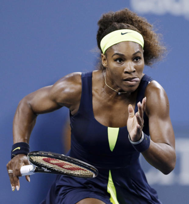 Serena Williams chases down a shot  