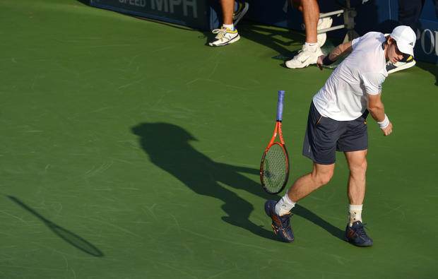 Andy Murray throws down his racket while playing Marin Cilic 