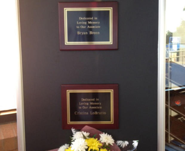 Plaques honoring two victims inside Old Bridge Pathmark  