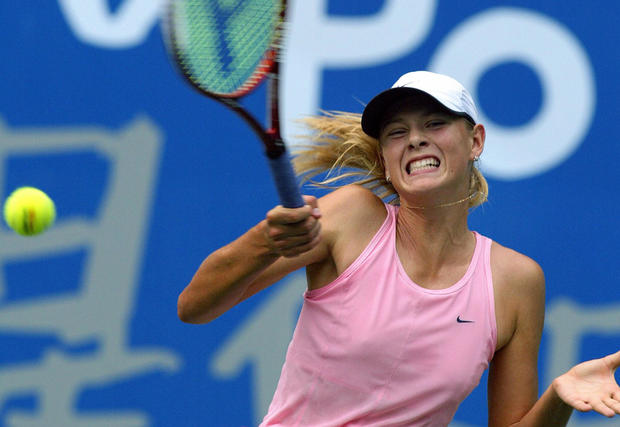 Maria Sharapova of Russia hits a return against Maria Sanchez Lorenzo 