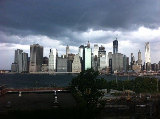 In this photo provided by Gothamist, dark clouds loom over the skyline, Saturday, Sept. 8, 2012, in New York. Two tornadoes struck New York City on Saturday, one swept out of the sea and hit a beachfront neighborhood and the second, stronger twister hit m 