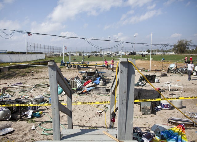 Damage is seen from a tornado that touched down on September 8, 2012 in the Breezy Point neighborhood of the Queens borough of New York City. The National Weather Service has issued a tornado watch as severe weather continues to move through New York metr 