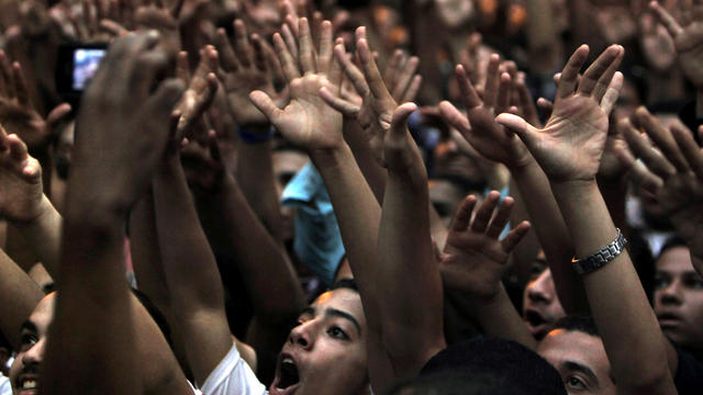 Egyptian protesters chant anti-U.S. slogans in front of U.S. Embassy in Cairo Tuesdat 