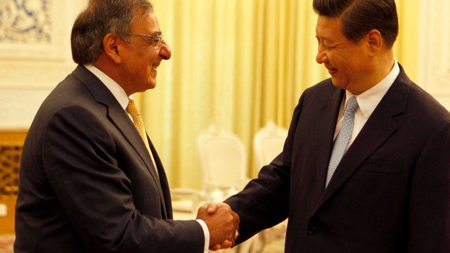 Panetta, left, shakes hands with China's Vice President Xi Jinping  