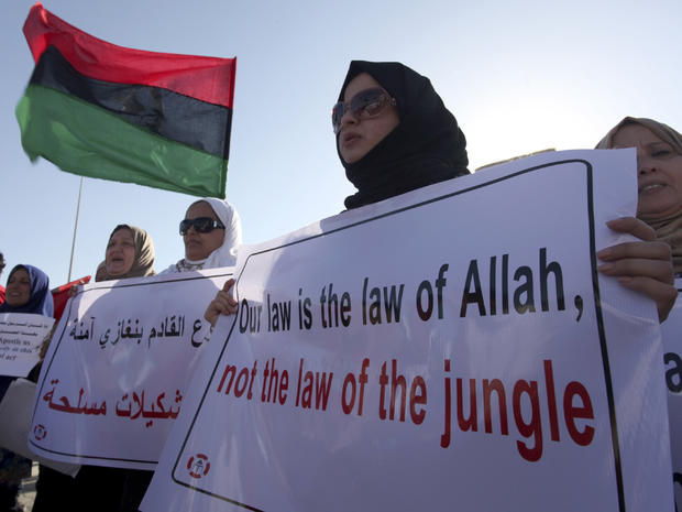 Libyan women protest against Ansar al-Shariah Brigades and other Islamic militias in front of the Tebesty Hotel in Benghazi, Libya, Sept. 21, 2012. 