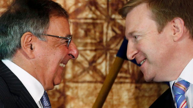 U.S. Secretary of Defense Leon Panetta, left, exchange smiles with his New Zealand counterpart, Jonathan Coleman, after their joint news conference in Auckland, New Zealand Friday 
