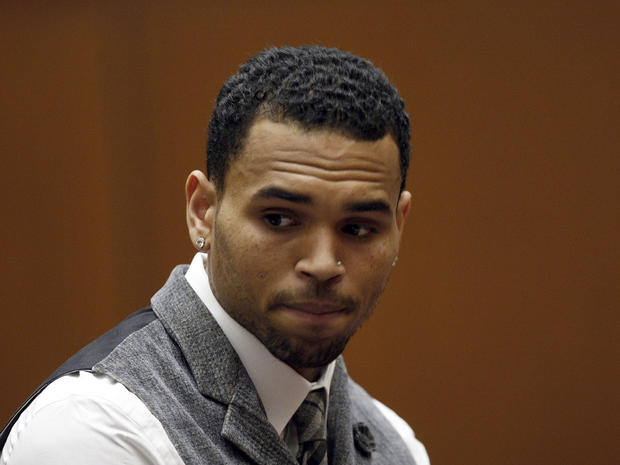R&B singer Chris Brown appears in a Los Angeles courtroom Monday, Sept. 24, 2012. Judge Patricia Schnegg has ordered a further review of Chris Brown's community service and travel to determine whether Brown has violated the terms of his probation for the  