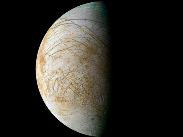 Complex and beautiful patterns adorn the icy surface of Jupiter's moon Europa, as seen in this color image intended to approximate how the satellite might appear to the human eye. 