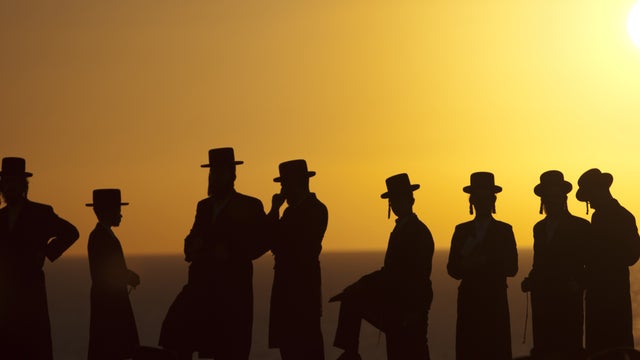 Ultra-Orthodox Jews of the Hassidic sect Vizhnitz gather on a hill overlooking the Mediterranean sea for a Tashlich ceremony in Herzliya, Israel, Monday, Sept. 24, 2012. Tashlich, which means "to cast away" in Hebrew, is the practice by which Jews go to a 