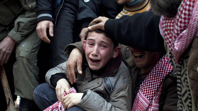 Ahmed, center, mourns his father Abdulaziz Abu Ahmed Khrer 