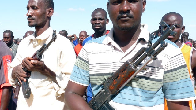 Malian civilians receive military training from an army instructor to fight Islamists in the north 