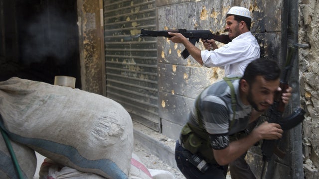 Rebels battle for Syria's largest city 