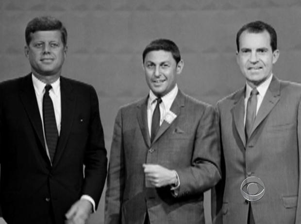 John F. Kennedy and Richard Nixon pose with "60 Minutes" founder Don Hewitt during the first televised presidential debate in 1960. 