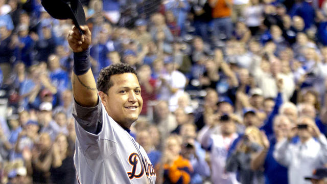 Detroit Tigers' Miguel Cabrera waves to the crowd after being replaced during the fourth inning of a baseball game against the Kansas City Royals at Kauffman Stadium in Kansas City, Mo., Wednesday, Oct. 3, 2012. Cabrera achieved baseball's first Triple Cr 