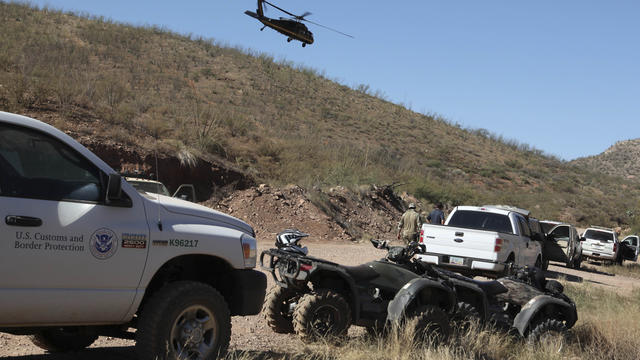 Photo provided by U.S. Customs and Border Protection shows law enforcement forces at command post in desert near Naco, Ariz. after Border Patrol agent was shot to death 