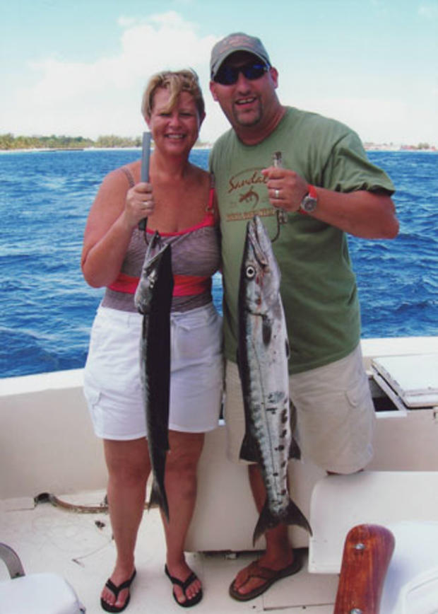 Robyn and Brian Davis show off a big catch. Brian loved being out on the water. 