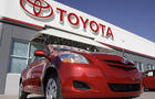 FILE - in this Oct. 22, 2006 file photo, the Toyota sign hangs over a 2007 Yaris sedan on sale on the lot of a Toyota dealership in the southeast Denver suburb of Centennial, Colo. Toyota Motor Corp. is recalling 7.43 million vehicles in the U.S., Japan,  
