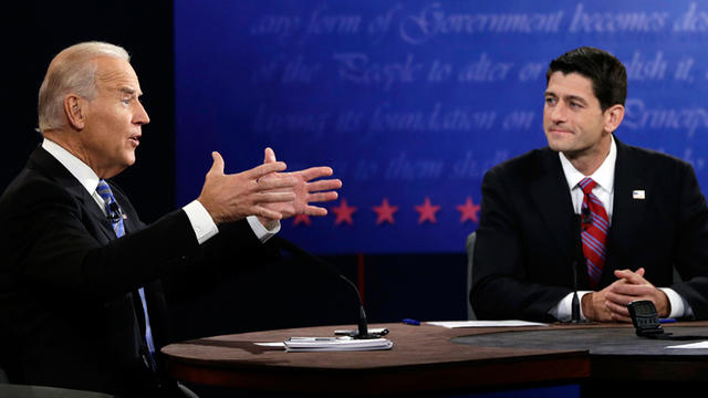 Republican vice presidential nominee Rep. Paul Ryan, of Wisconsin, right, listens as Vice President Joe Biden speaks during the vice presidential debate at Centre College, Thursday, Oct. 11, 2012, in Danville, Ky. 