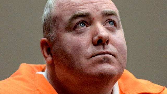 Michael Skakel looks up while listening to a statement from John Moxley, unseen, brother of victim Martha Moxley, in court in Middletown, Conn., Jan. 24, 2012. 