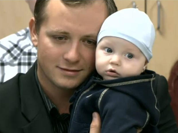 Denis Bukhantsov and baby 