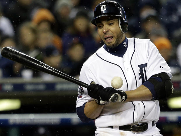 Detroit Tigers' Omar Infante is hit by a pitch during the ninth inning of Game 4 of the World Series against the San Francisco Giants Oct. 28, 2012, in Detroit. 