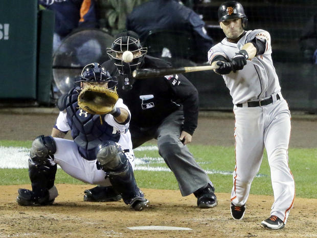 San Francisco Giants second baseman Marco Scutaro hits an RBI single during the 10th inning of Game 4 of the World Series against the Detroit Tigers Oct. 28, 2012, in Detroit. 