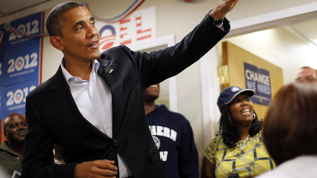 President Obama waves to volunteers during an unscheduled visit to a local campaign field office Oct. 28, 2012, in Orlando, Fla. 