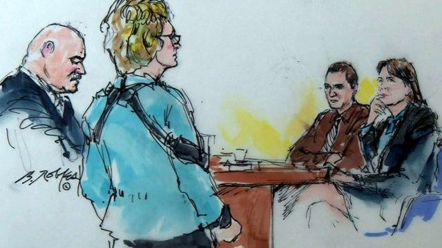 Mark Kelly, left, walks with his wife, former Rep. Gabrielle Giffords, near Jared Lee Loughner and one of his attorneys, Judy Clarke, in federal court in Tucson, Ariz., Nov. 8, 2012, in this sketch by Bill Robles. 