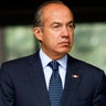 Mexican President Felipe Calderon arrives at a press conference at his official residence in Mexico City Oct. 10, 2012. 