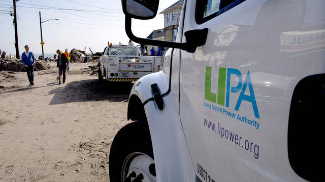 A Long Island Power Authority truck is seen in the Belle Harbor neighborhood of the borough of Queens, New York, Nov. 12, 2012, in the wake of superstorm Sandy. 