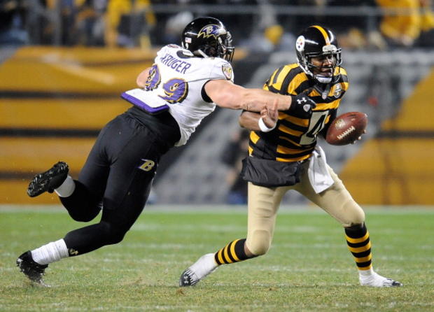 Steelers quarterback Byron Leftwich avoids being sacked by Paul Kruger of the Baltimore Ravens. 