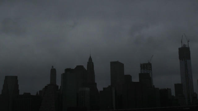 Dark clouds appear over the skyline of Manhattan as as Hurricane Sandy arrives on Oct. 29, 2012, in New York. 