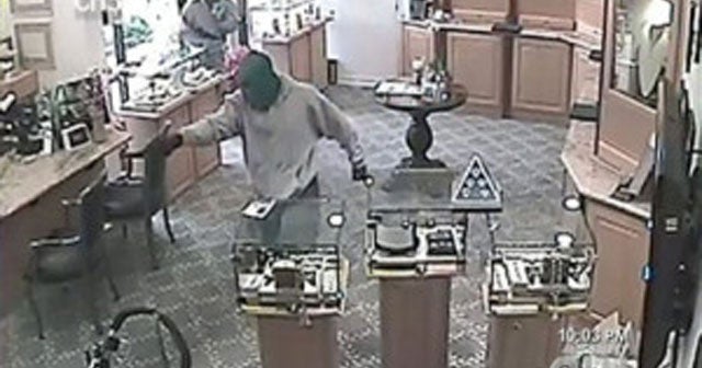 Caught on tape Masked robbers hold up Calif. jewelry store in broad daylight CBS News