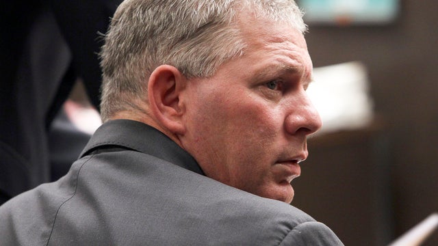Former New York Mets and Philadelphia Phillies star outfielder Lenny Dykstra is seen during his sentencing for grand theft auto in Los Angeles in this March 5, 2012 file photo. Dykstra has been sentenced in Los Angeles Monday, Dec. 3, 2012, to six and a h 