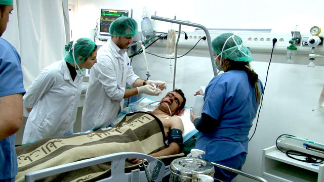 A man is treated at the Tishereen military hospital in northern Damascus. 