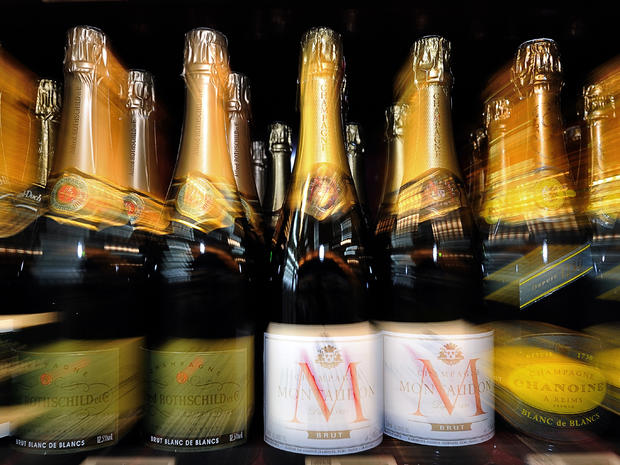 Champagne bottles line the shelves of a supermarket in the northern city of Bailleul, France, Feb. 15, 2012. 