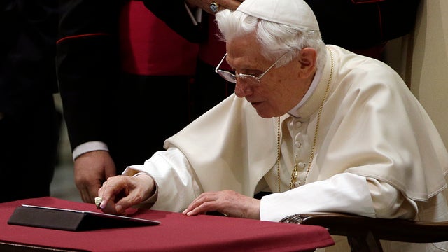 Pope Benedict XVI pushes a button on a tablet at the Vatican, Wednesday, Dec. 12, 2012. In perhaps the most drawn out Twitter launch ever, Pope Benedict XVI pushed the button on a tablet brought to him at the end of his general audience Wednesday. It read 
