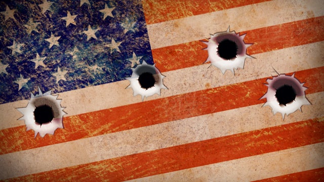 US flag bullet holes 