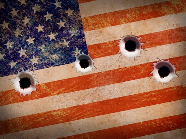 US flag bullet holes