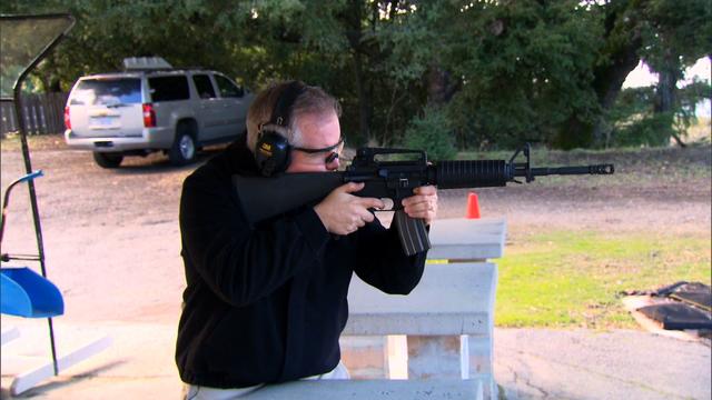 Gene Hoffman uses one of his guns. He owns a total of 15. 