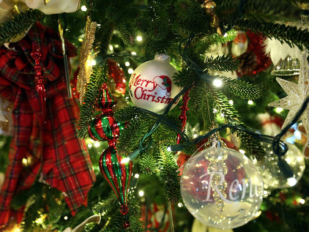 Ornaments on a Christmas tree are seen during a preview of the 2012 White House holiday decorations Nov. 28, 2012, at the White House in Washington. 