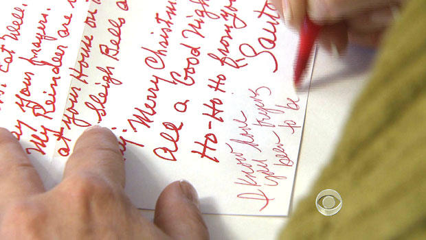 Volunteers in Santa Claus, Ind., respond to letters from children to Santa. 