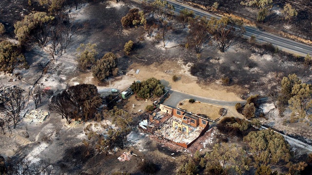 Homes destroyed by a wildfire between Dunalley and Boomer Bay, east of the Tasmanian capital of Hobart 