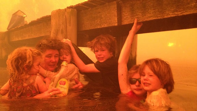 In this Jan. 4, 2013, photo provided by the Holmes family, Tammy Holmes, second from left, and her grandchildren, two-year-old Charlotte Walker, left, four-year-old Esther Walker, third from left, nine-year-old Liam Walker, eleven-year-old Matilda, second 
