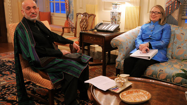 Afghan President Hamid Karzai meets Secretary of State Hillary Clinton at the State Department 